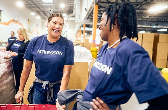 McKesson warehouse workers laughing together