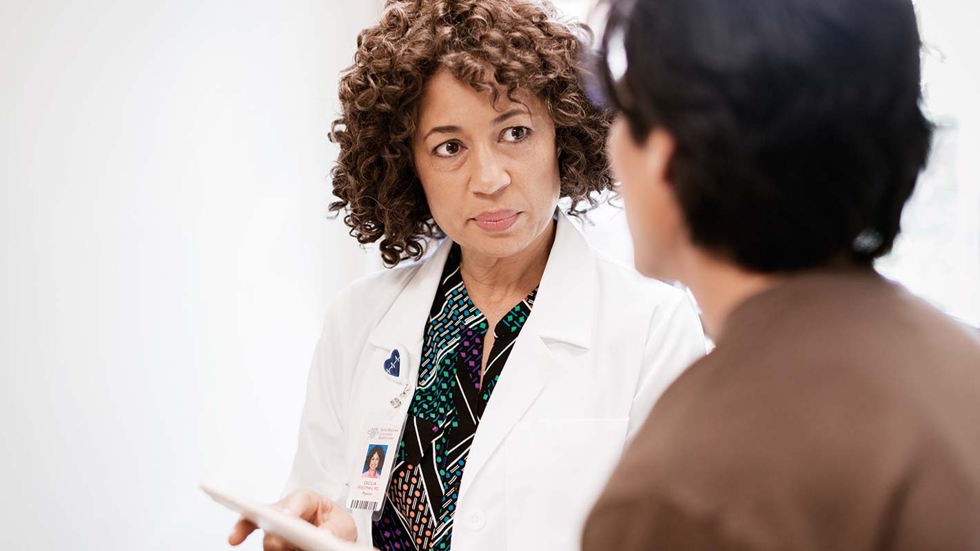 A doctor consulting with a patient
